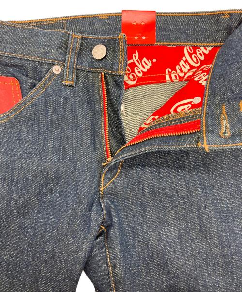 LEVI'S（リーバイス）LEVI'S (リーバイス) Coca Cola 3Dジーンズ インディゴ サイズ:SIZE 68.5cm (W27) 未使用品の古着・服飾アイテム