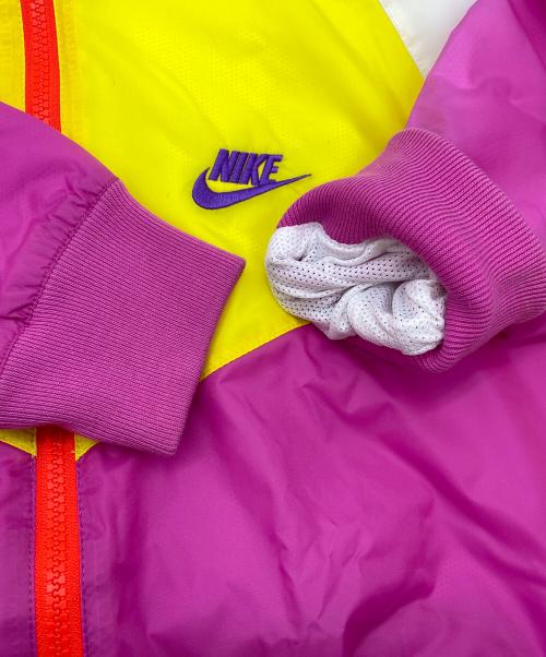 NIKE（ナイキ）NIKE (ナイキ) PACKABLE HOOD WINDBREAKER イエロー×ピンク サイズ:SIZE US S 未使用品の古着・服飾アイテム