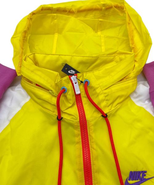 NIKE（ナイキ）NIKE (ナイキ) PACKABLE HOOD WINDBREAKER イエロー×ピンク サイズ:SIZE US S 未使用品の古着・服飾アイテム