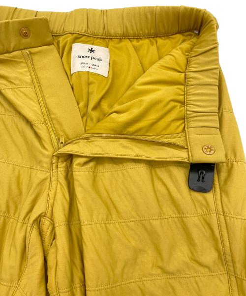 Snow peak（スノーピーク）Snow peak (スノーピーク) フレキシブルインサレーションパンツ マスタードイエロー サイズ:SIZE Mの古着・服飾アイテム