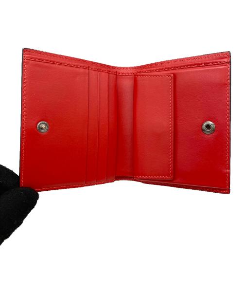 Christian Louboutin（クリスチャン・ルブタン）Christian Louboutin (クリスチャン・ルブタン) スタッズモチーフ二つ折り財布 ブラックの古着・服飾アイテム