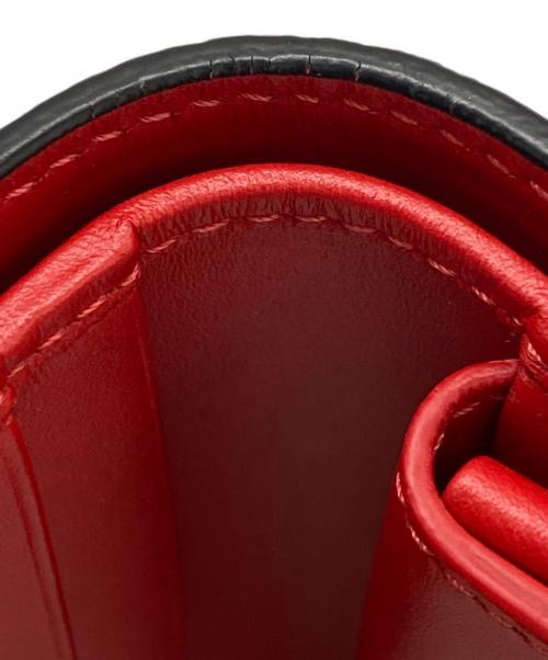 Christian Louboutin（クリスチャン・ルブタン）Christian Louboutin (クリスチャン・ルブタン) スタッズモチーフ二つ折り財布 ブラックの古着・服飾アイテム