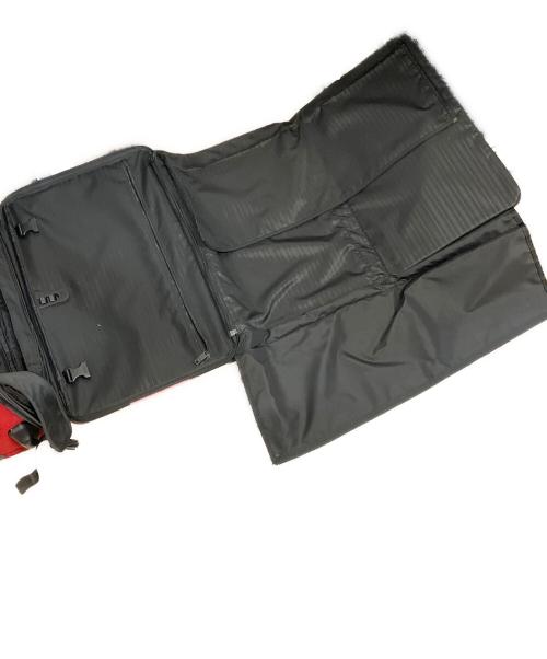 TUMI（トゥミ）TUMI (トゥミ) キャリーバッグ レッド×ブラックの古着・服飾アイテム