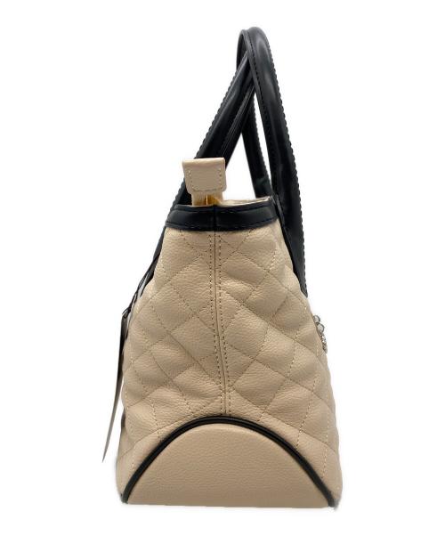 CLATHAS（クレイサス）CLATHAS (クレイサス) キルティングハンドバッグ ベージュ×ブラック 未使用品の古着・服飾アイテム
