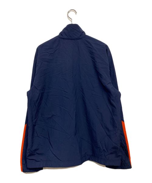 イリノイ大学（イリノイ）イリノイ大学 (イリノイ) NIKE TEAM (ナイキチーム) NCAA チームロゴジャケット ネイビー×オレンジロゴ サイズ:SIZE LL (US L)の古着・服飾アイテム