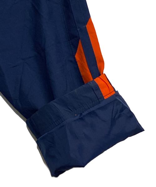 イリノイ大学（イリノイ）イリノイ大学 (イリノイ) NIKE TEAM (ナイキチーム) NCAA チームロゴジャケット ネイビー×オレンジロゴ サイズ:SIZE LL (US L)の古着・服飾アイテム