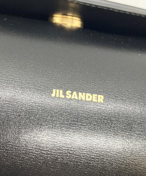 JIL SANDER（ジルサンダー）JIL SANDER (ジルサンダー) エンボスロゴ レザーハンドバッグ ブラックの古着・服飾アイテム