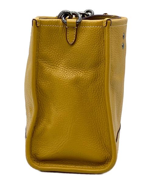 COACH（コーチ）COACH (コーチ) PEANUTS (ピーナッツ) 2WAYバッグ イエローの古着・服飾アイテム