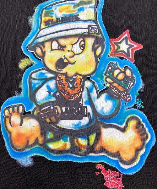 X-LARGE（エクストララージ）X-LARGE (エクストララージ) SHIRT KING PHADE (シャツキングフェイド) グラフィティダック地ベスト ブラック サイズ:SIZE Lの古着・服飾アイテム