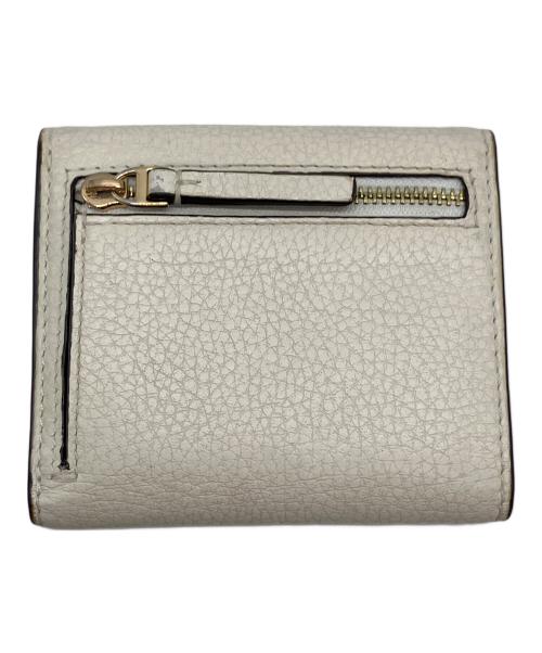 TORY BURCH（トリーバーチ）TORY BURCH (トリーバーチ) コンパクトウォレット ホワイトベージュの古着・服飾アイテム