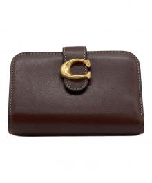 COACH（コーチ）の古着「2つ折り財布」｜ブラウン