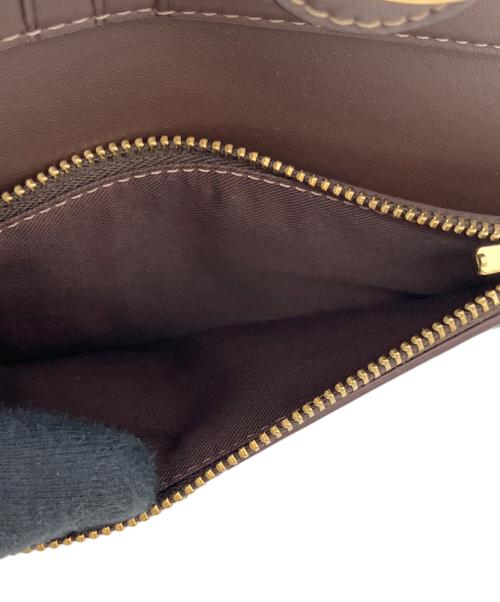 COACH（コーチ）COACH (コーチ) 2つ折り財布 ブラウンの古着・服飾アイテム
