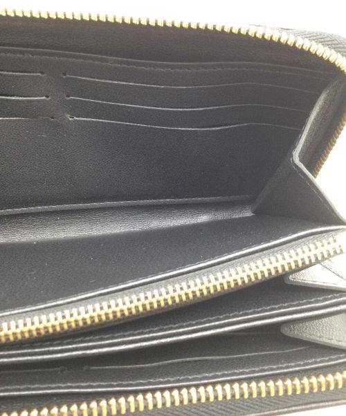 LOUIS VUITTON（ルイ ヴィトン）LOUIS VUITTON (ルイ ヴィトン) エンボスジッピーウォレット ブラックの古着・服飾アイテム