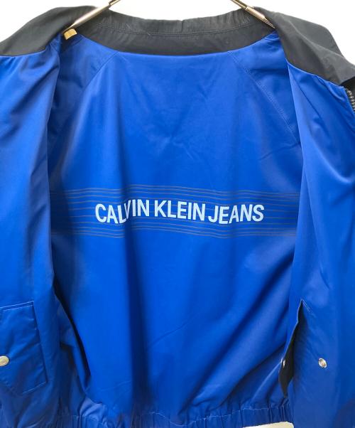 Calvin Klein Jeans（カルバンクラインジーンズ）Calvin Klein Jeans (カルバンクラインジーンズ) リバーシブルジャケット ネイビー×ブルー サイズ:Lの古着・服飾アイテム