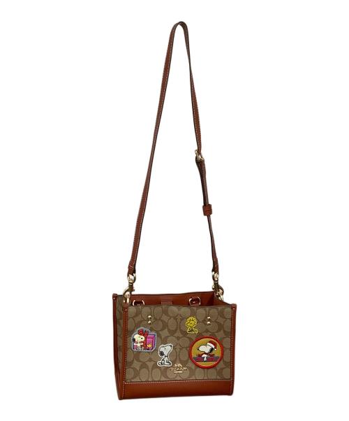 COACH（コーチ）COACH (コーチ) PEANUTS (ピーナッツ) COACH X PEANUTS デンプシー トート 22・シグネチャー キャンバス・パッチの古着・服飾アイテム