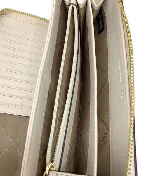 MICHAEL KORS（マイケル・コース）MICHAEL KORS (マイケルコース) ラウンドファスナー財布　ブラック×ホワイト ブラック×ホワイトの古着・服飾アイテム