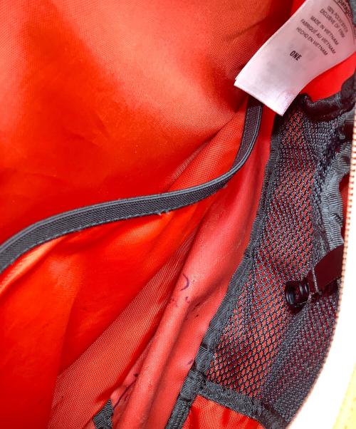 Patagonia（パタゴニア）Patagonia (パタゴニア) アトムスリング ショルダーバッグ オレンジの古着・服飾アイテム