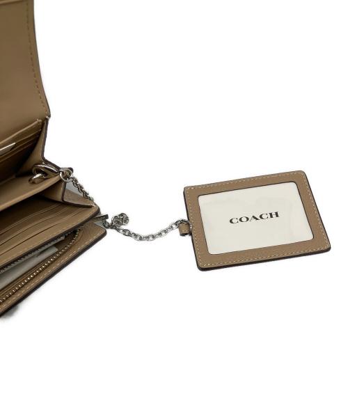 COACH（コーチ）COACH (コーチ) エッセンシャル フラップ ウォレット ベージュの古着・服飾アイテム