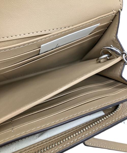 COACH（コーチ）COACH (コーチ) エッセンシャル フラップ ウォレット ベージュの古着・服飾アイテム