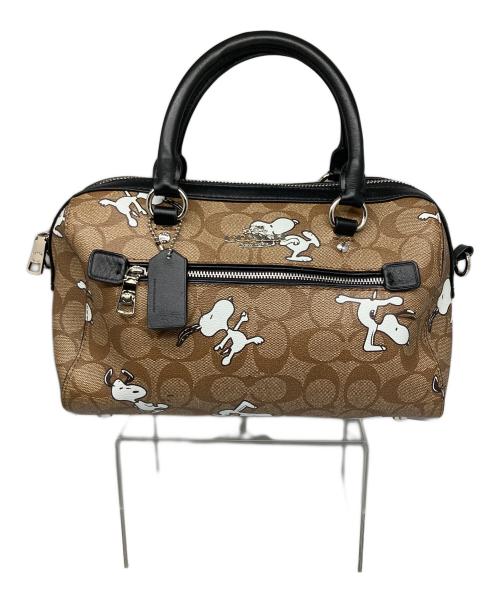 COACH（コーチ）COACH (コーチ) PEANUTS (ピーナッツ) シグネチャースヌーピーローワンサッチェルバッグ ブラウンの古着・服飾アイテム