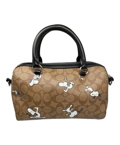 COACH（コーチ）COACH (コーチ) PEANUTS (ピーナッツ) シグネチャースヌーピーローワンサッチェルバッグ ブラウンの古着・服飾アイテム