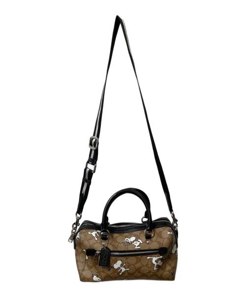 COACH（コーチ）COACH (コーチ) PEANUTS (ピーナッツ) シグネチャースヌーピーローワンサッチェルバッグ ブラウンの古着・服飾アイテム