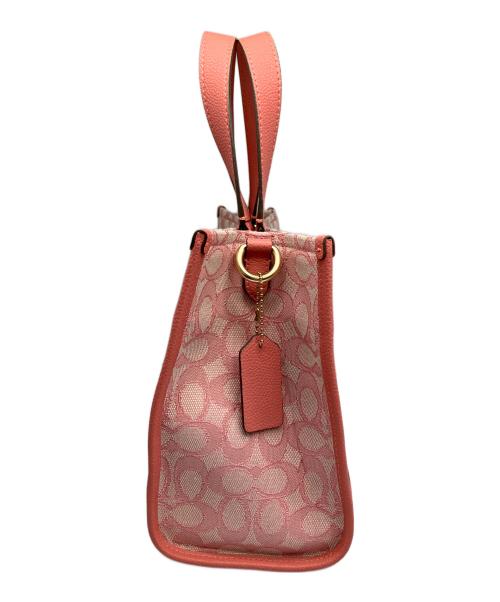 COACH（コーチ）COACH (コーチ) デンプシー キャリーオール・シグネチャー ジャカード・ストライプ アンド コーチ パッチ ピンクの古着・服飾アイテム