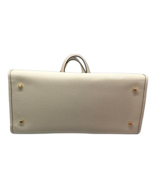 COACH（コーチ）COACH (コーチ) ジャカード ウィズ ストライプ アンド コーチ パッチ ベージュ×ホワイトの古着・服飾アイテム