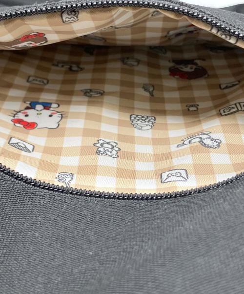 MONCHHICHI（モンチッチ）MONCHHICHI (モンチッチ) HELLO KITTY (ハローキティ) バックパック モンチッチ×ハローキティ ブラックの古着・服飾アイテム