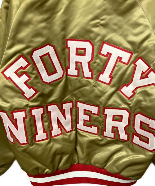 NFL（エヌエフエル）NFL (エヌエフエル) Chalk Line (チョークライン) ナイロンスタジャン NFL ゴールド サイズ:Sの古着・服飾アイテム