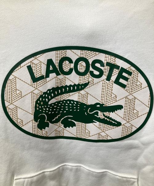 LACOSTE（ラコステ）LACOSTE (ラコステ) モノグラムモチーフラコステプリントフードスウェット ホワイト サイズ:Mの古着・服飾アイテム