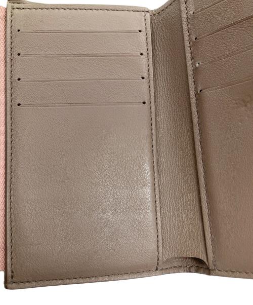 LOUIS VUITTON（ルイ ヴィトン）LOUIS VUITTON (ルイ ヴィトン) ポルトフォイユ・カプシーヌ ピンクの古着・服飾アイテム