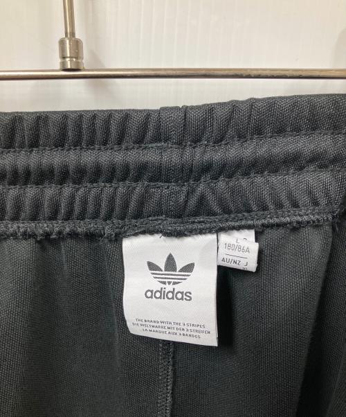 adidas Originals（アディダスオリジナル）adidas originals (アディダスオリジナル) バギーフィット ファイヤーバードトラックパンツ ブラック サイズ:Lの古着・服飾アイテム