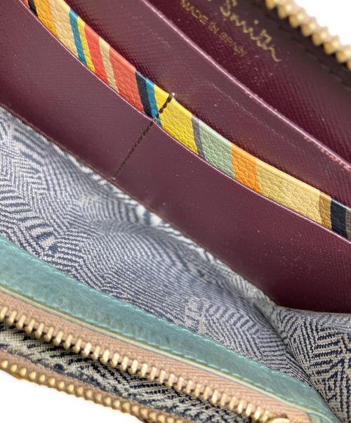 PAUL SMITH（ポールスミス）Paul Smith (ポールスミス) ラウンドファスナー財布 ブラック×レッド レッドの古着・服飾アイテム