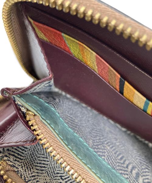 PAUL SMITH（ポールスミス）Paul Smith (ポールスミス) ラウンドファスナー財布 ブラック×レッド レッドの古着・服飾アイテム