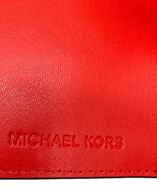 MICHAEL KORS（マイケル・コース）MICHAEL KORS (マイケル・コース) 2つ折り財布 レッドの古着・服飾アイテム