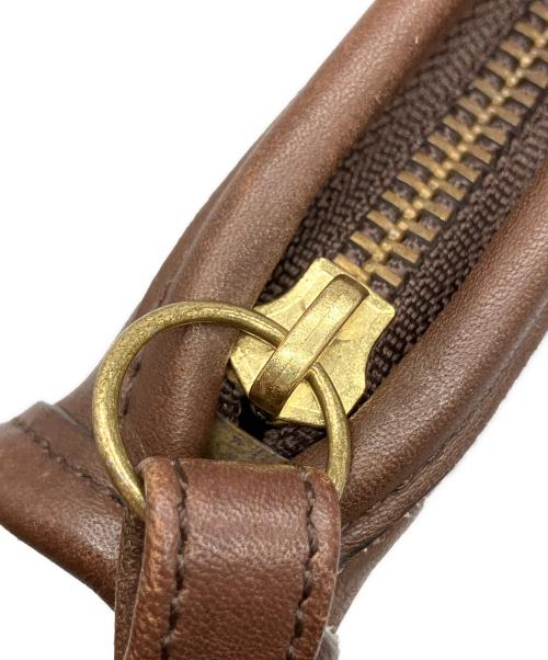 COACH（コーチ）COACH (コーチ) クラッチバッグ ブラウンの古着・服飾アイテム