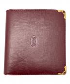 Cartierカルティエ）の古着「2つ折り財布」｜ワインレッド