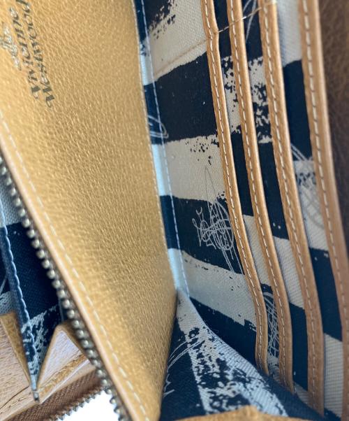 Vivienne Westwood（ヴィヴィアンウエストウッド）Vivienne Westwood (ヴィヴィアンウエストウッド) ラウンドファスナー財布 ブラウン ベージュの古着・服飾アイテム