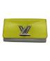 LOUIS VUITTON（ルイ ヴィトン）の古着「ポルトフォイユ・ツイスト」｜イエロー×グレー