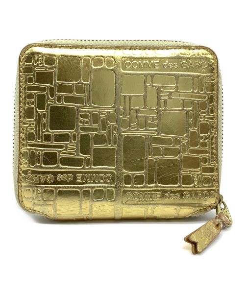 COMME des GARCONS（コムデギャルソン）COMME des GARCONS (コムデギャルソン) 2つ折り財布 ゴールドの古着・服飾アイテム