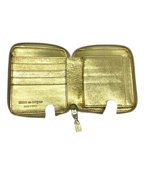 COMME des GARCONS（コムデギャルソン）COMME des GARCONS (コムデギャルソン) 2つ折り財布 ゴールドの古着・服飾アイテム