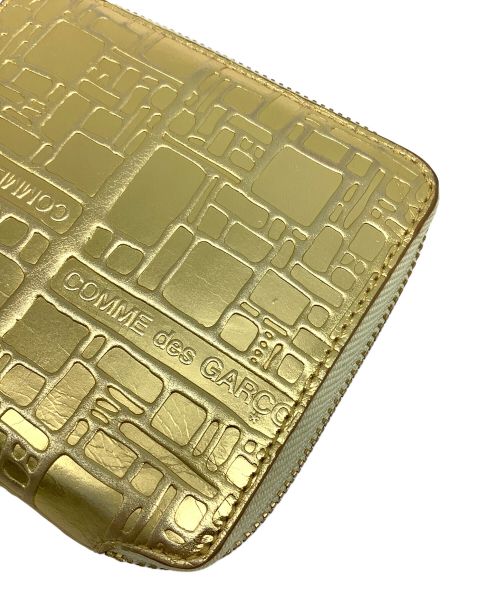 COMME des GARCONS（コムデギャルソン）COMME des GARCONS (コムデギャルソン) 2つ折り財布 ゴールドの古着・服飾アイテム
