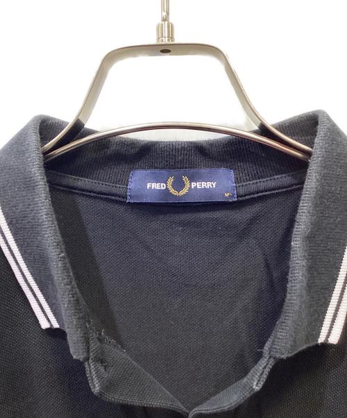 FRED PERRY（フレッドペリー）FRED PERRY (フレッドペリー) ポロシャツ ブラック×ホワイト サイズ:Mの古着・服飾アイテム