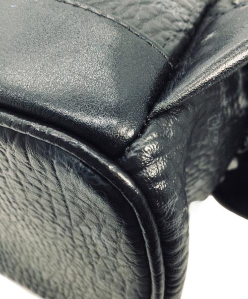 MCM（エムシーエム）MCM (エムシーエム) サイドスタッズバックパック ブラックの古着・服飾アイテム