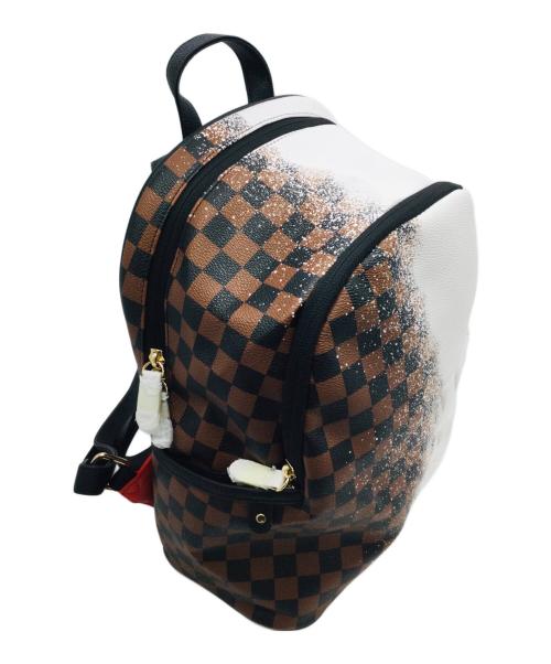SPRAYGROUND（スプレーグランド）SPRAYGROUND (スプレーグランド) リュック ブラウン×ホワイト 未使用品の古着・服飾アイテム