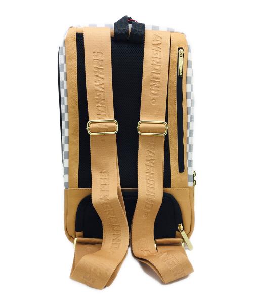 SPRAYGROUND（スプレーグランド）SPRAYGROUND (スプレーグランド) リュック グレー×ベージュ 未使用品の古着・服飾アイテム