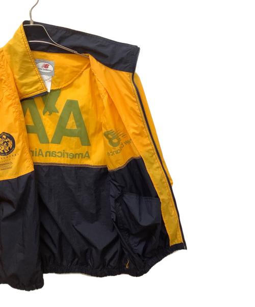 NEW BALANCE（ニューバランス）NEW BALANCE (ニューバランス) ウインドブレーカー オレンジ×ネイビー サイズ:Lの古着・服飾アイテム