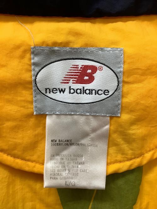 NEW BALANCE（ニューバランス）NEW BALANCE (ニューバランス) ウインドブレーカー オレンジ×ネイビー サイズ:Lの古着・服飾アイテム