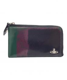Vivienne Westwood（ヴィヴィアンウエストウッド）の古着「ラウンドファスナー財布」｜グリーン×パープル